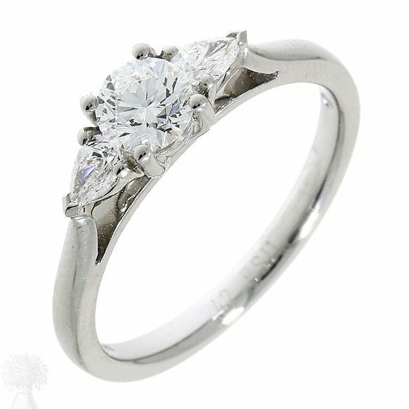 Platinum 3 Stone Brilliant & Pear Cut Diamond Ring