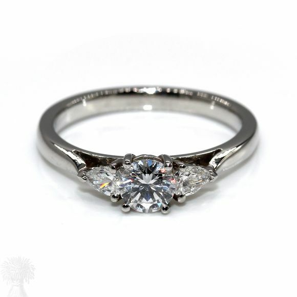 Platinum 3 Stone Brilliant & Pear Cut Diamond Ring