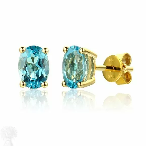 9ct Yellow Gold Single Stone Oval Blue Topaz Stud Earrings